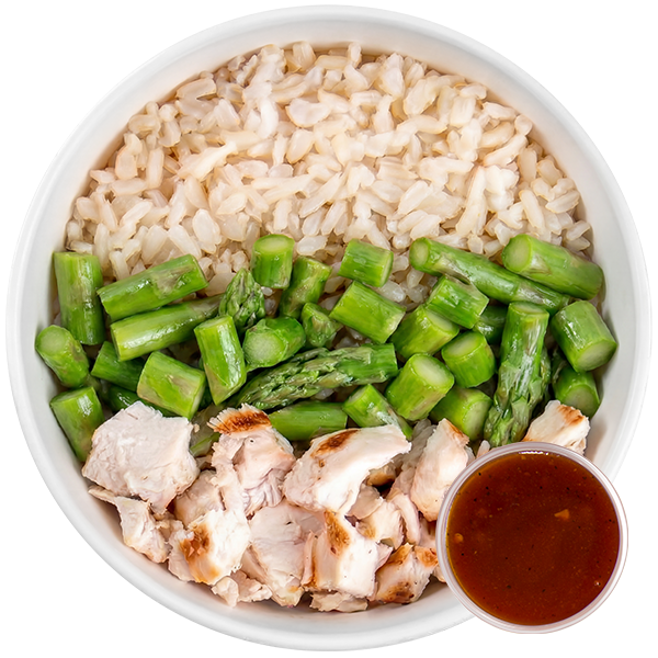 Meal prep bowl with white rice, asparagus, chicken and BBQ Sauce.